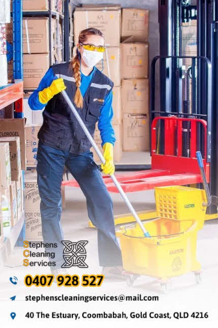 A woman in a cleaning uniform with a mop and bucket