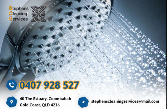 A showerhead being cleaned with a cleaning solution