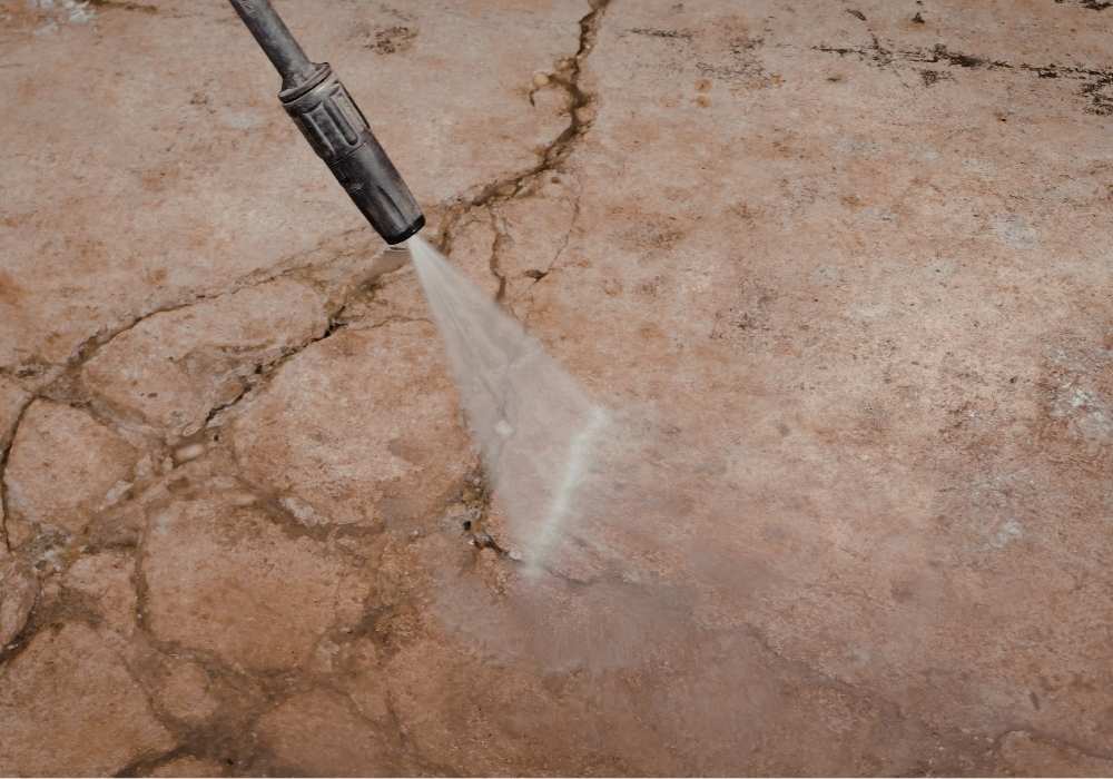 can pressure washing damage concrete